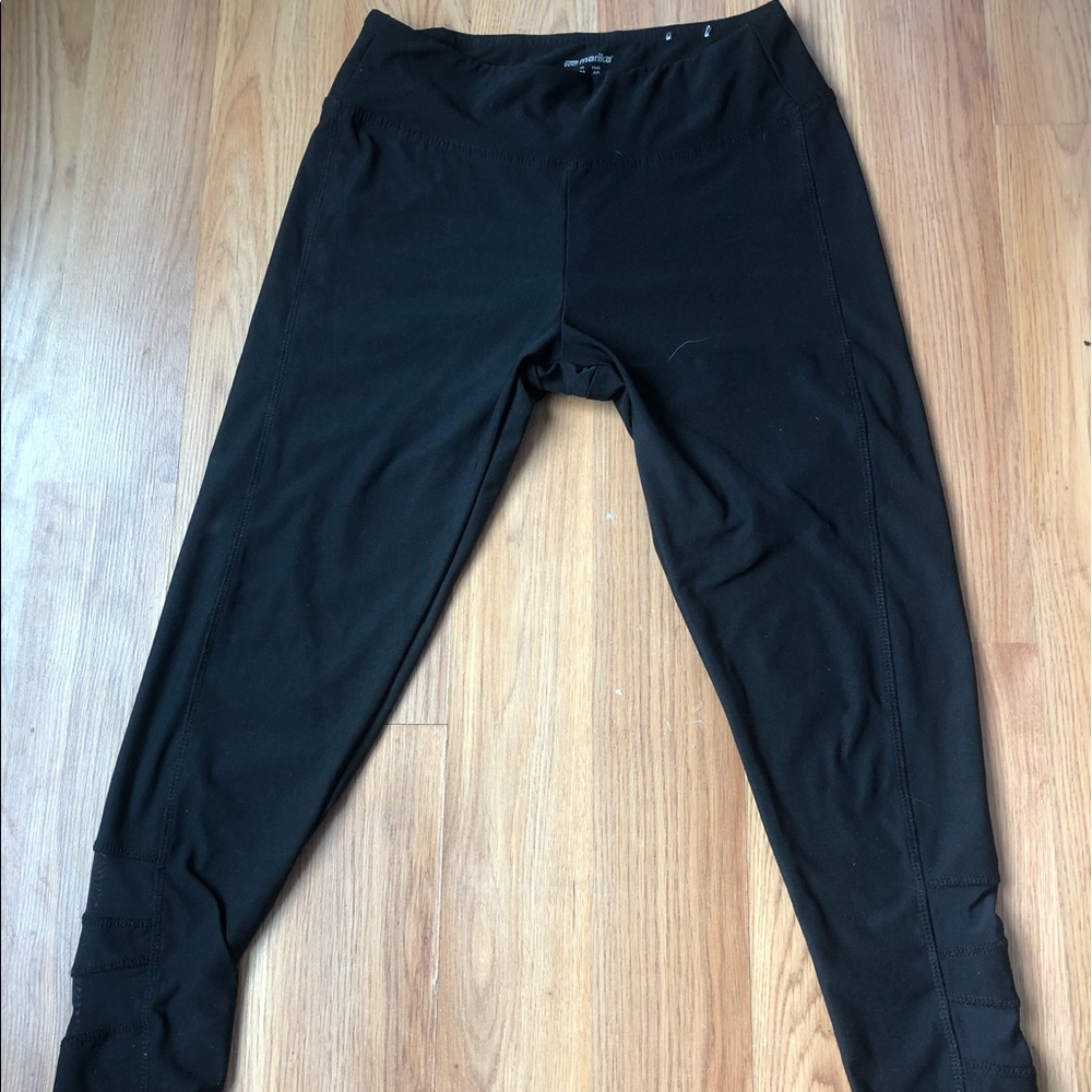 Black leggings with mesh near the ankles